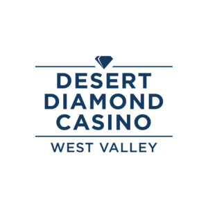 The logo for Desert Diamond Casino West Valley features a simple, elegant design on a white background. At the top, a small, black-outlined diamond shape is centered, symbolizing the "Diamond" in the name. Below the diamond, the words "DESERT DIAMOND CASINO" are written in bold, uppercase, dark blue letters, with "DESERT DIAMOND" on the top line and "CASINO" on the bottom line, separated by a thin horizontal line. Underneath "CASINO," the words "WEST VALLEY" are written in smaller, uppercase dark blue letters. The overall design is clean and professional, evoking a sense of luxury and gaming associated with the casino brand.